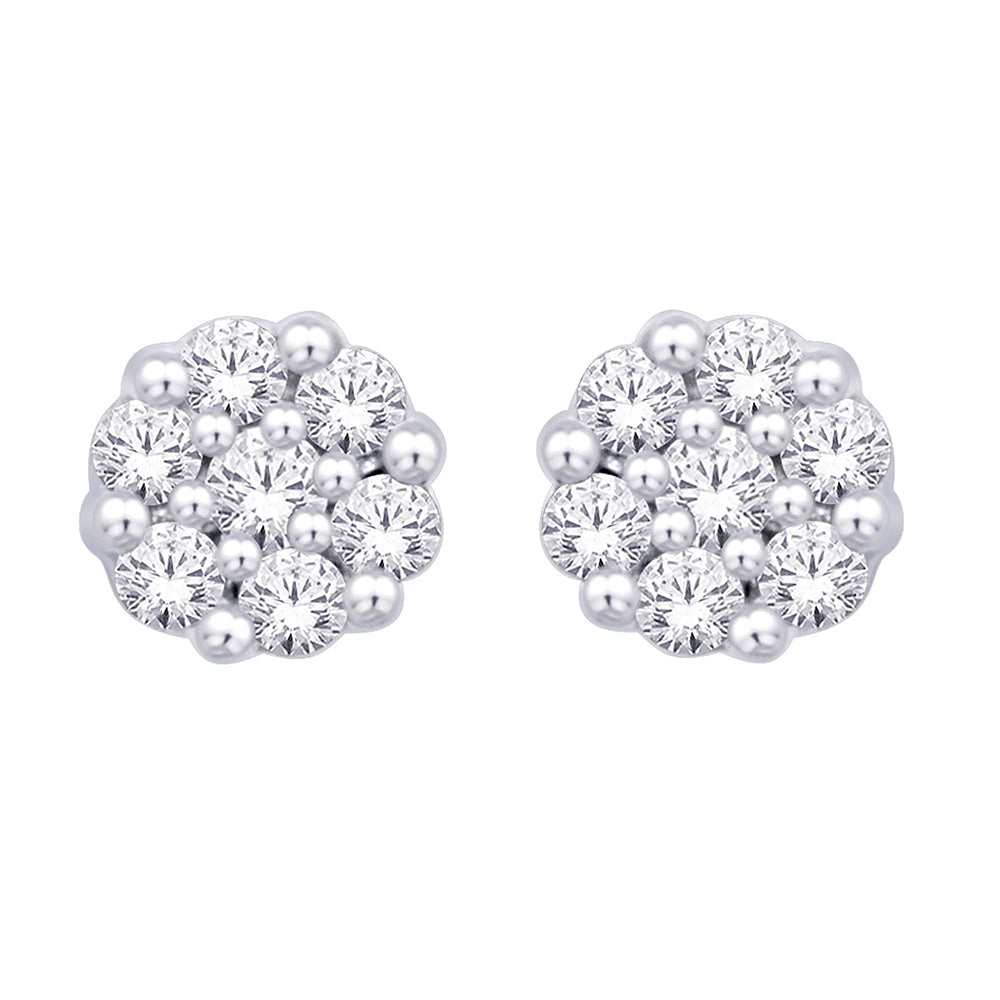 Oro blanco de 14 quilates de 1/3 quilates total. Aretes con forma de flor de diamantes