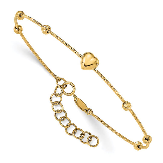 Pulsera Bangle Flexible con Corazón y Bolitas en Corte Diamante con Extensor de 1 pulgada en Oro Amarillo de 14kCuentas D/C de 14K con corazón con extensión de 1 pulgada. Brazalete flexible