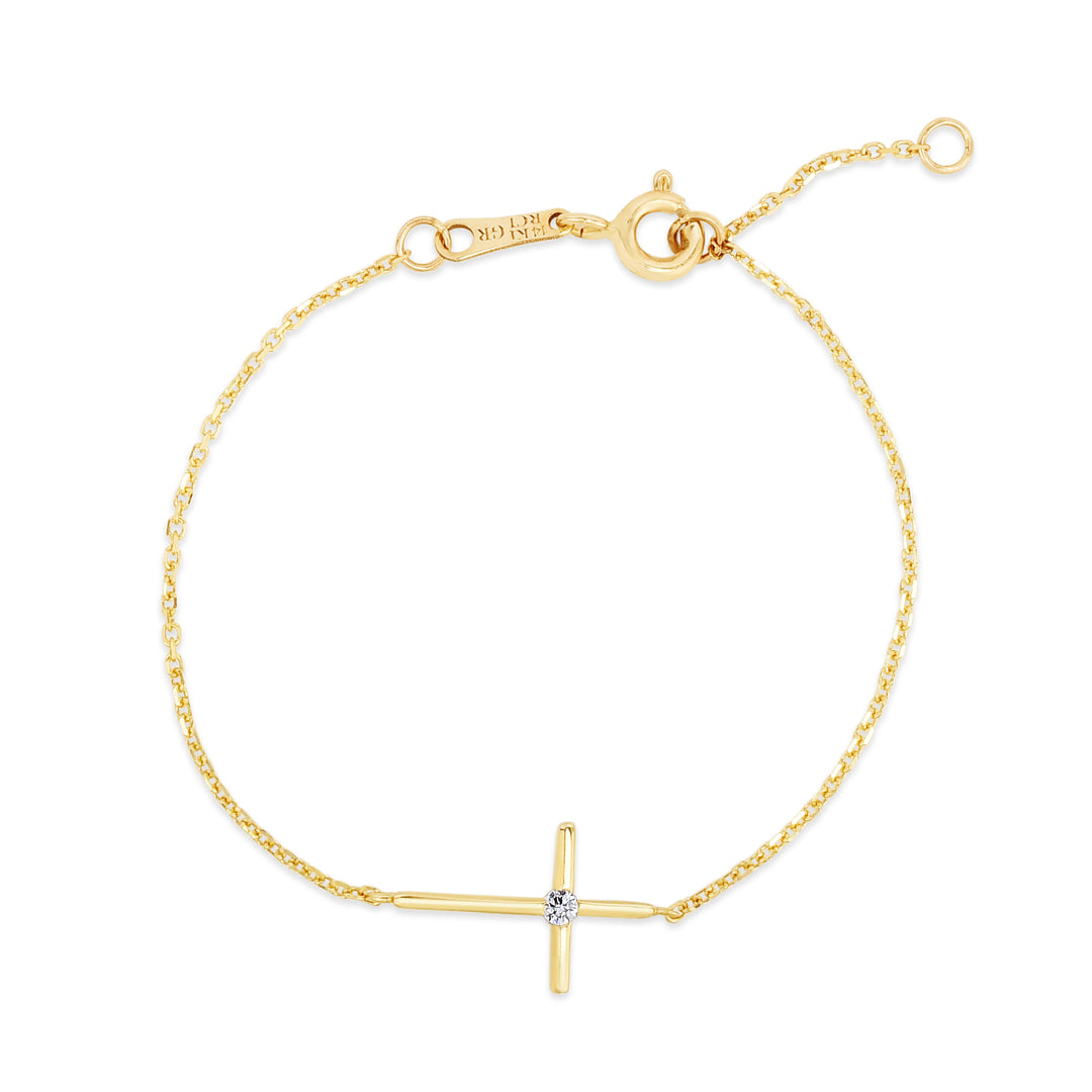 Pulsera cruzada lateral con circonita cúbica en oro de 14 quilates