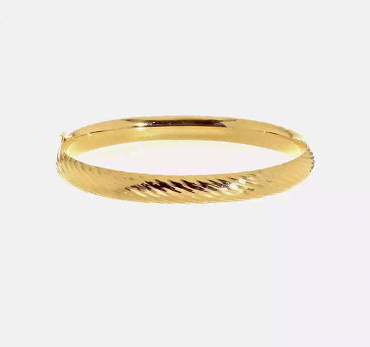 Brazalete Articulado Texturizado en Oro Amarillo de 14K con Acabado Pulido