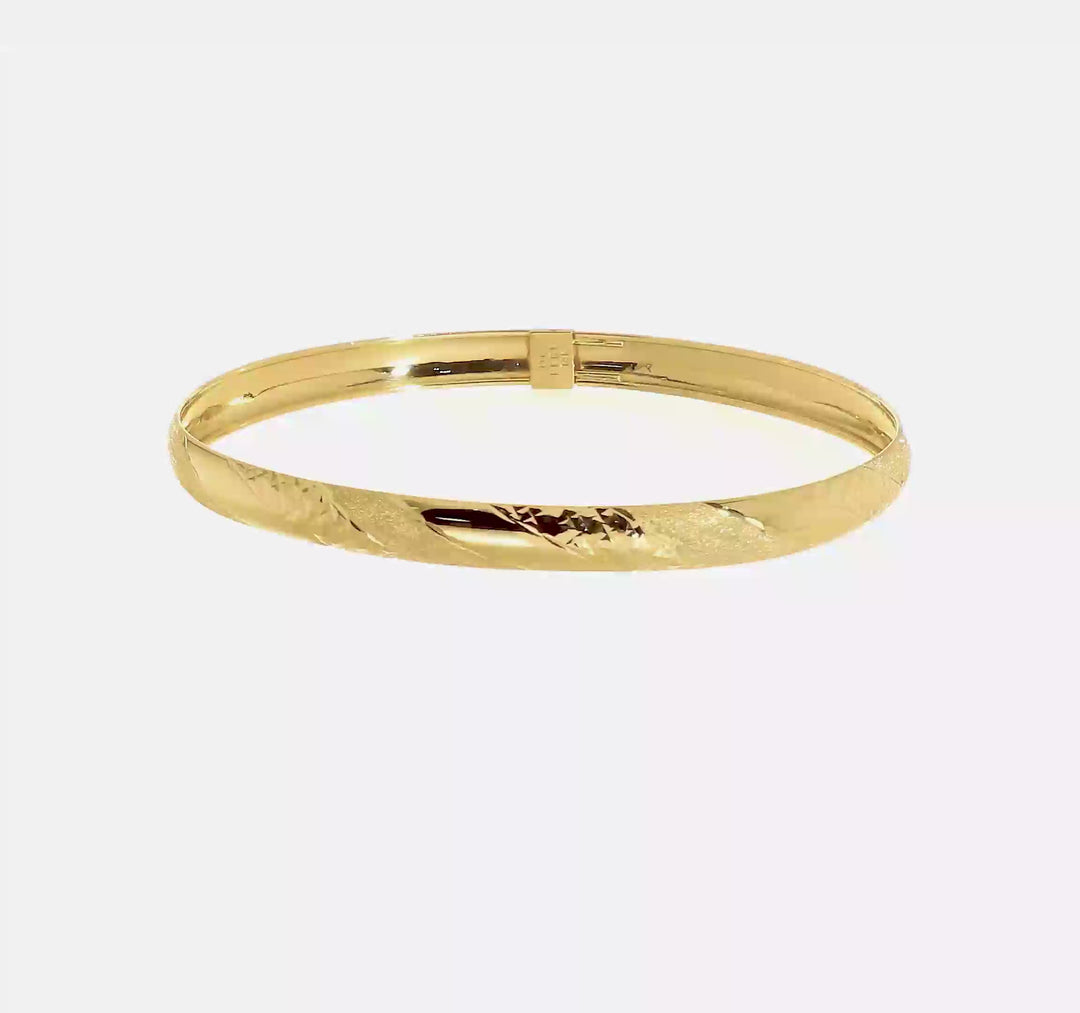 Brazalete Flexible Retorcido con Corte de Diamante en Oro Amarillo de 14K