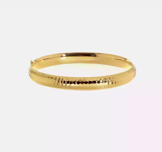 Pulsera Rígida Articulada de Oro Amarillo de 14k con Textura Martillada y Diseño Elegante