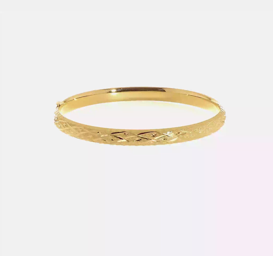 Pulsera Rígida Articulada de Oro Amarillo de 14k con Diseño Elegante y Corte de Diamante