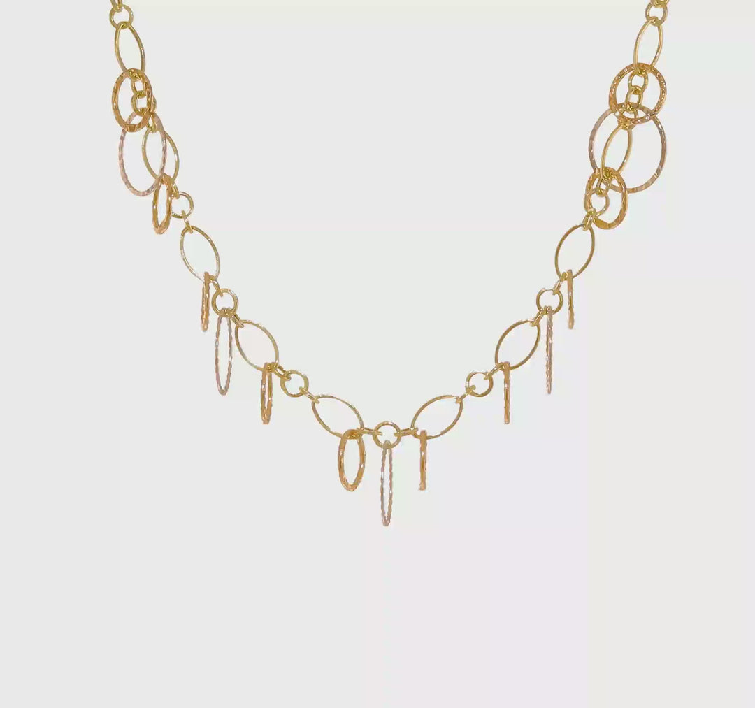 Collar de Anillos Colgantes Pulidos en Oro Tricolor de 14K con 2 pulgadas de Extensión